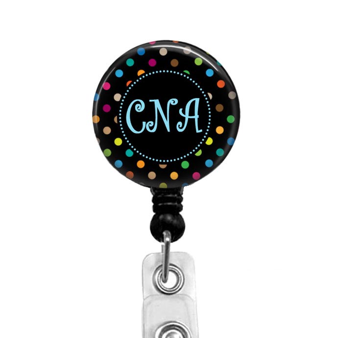 CNA badge reel with polka dots on black background